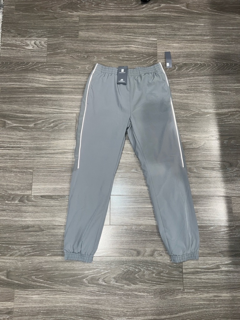 New Balance Grey Fleece-Lined Track Pants with Reflective Accent